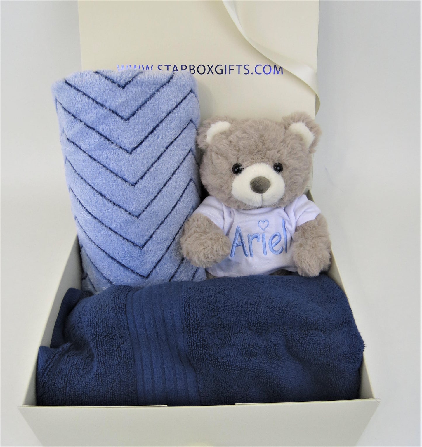 Shop our swaddle boxes at Starbox Gifts.